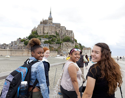 students touring around a city in Europe